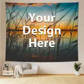 Wall tapestry with placeholder text ’Your Design Here’ overlaid on a sunset scene with silhouetted reeds.
